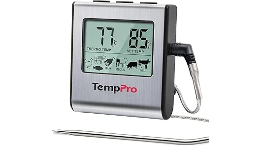 The image shows a person using a meat thermometer to check the temperature of a pork roast.